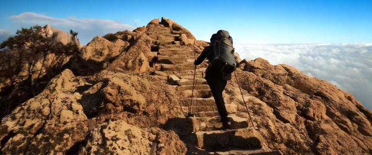 blog christianitychallenges2025 climbing up steep mountain